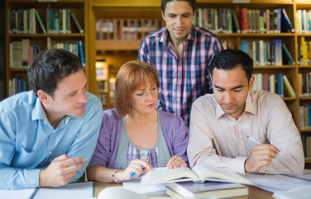 teachers studying together to build up teachers in the classroom