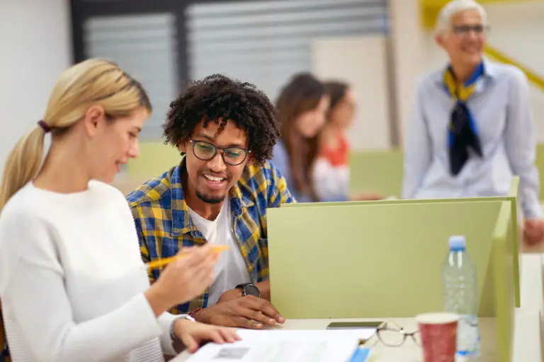 teachers helping each other prepare for class